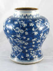 Appraisal: A Chinese squat baluster vase circa with prunus on cracked