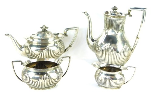 Appraisal: An Edward VII silver four piece tea service with part