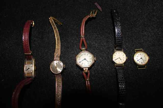 Appraisal: A CT GOLD LADIES WRISTWATCH by Tissot with integral strap