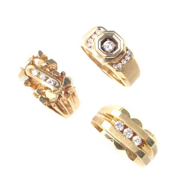 Appraisal: A collection of four diamond gem-set and gold gent's rings