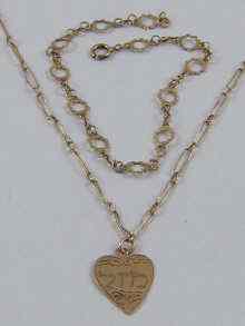 Appraisal: A yellow metal tests ct gold heart shaped pendant with