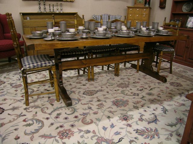 Appraisal: Solid pine trestle table and eight chairs all th century