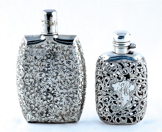 Appraisal: American sterling flasks late th century silver overlay on colorless