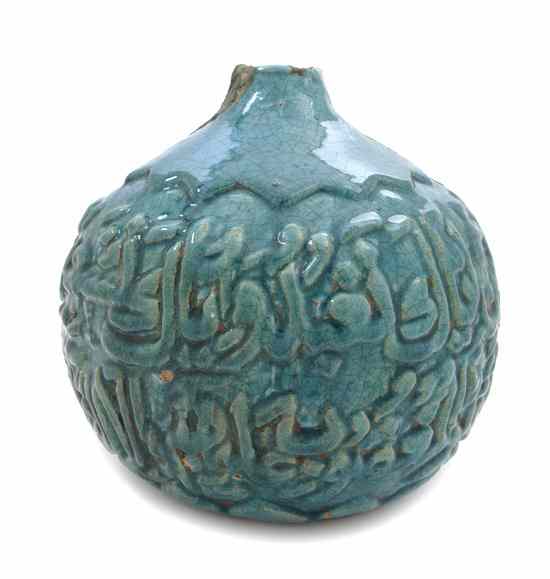 Appraisal: A Middle Eastern Turquoise Glaze Pottery Vase of ovoid form