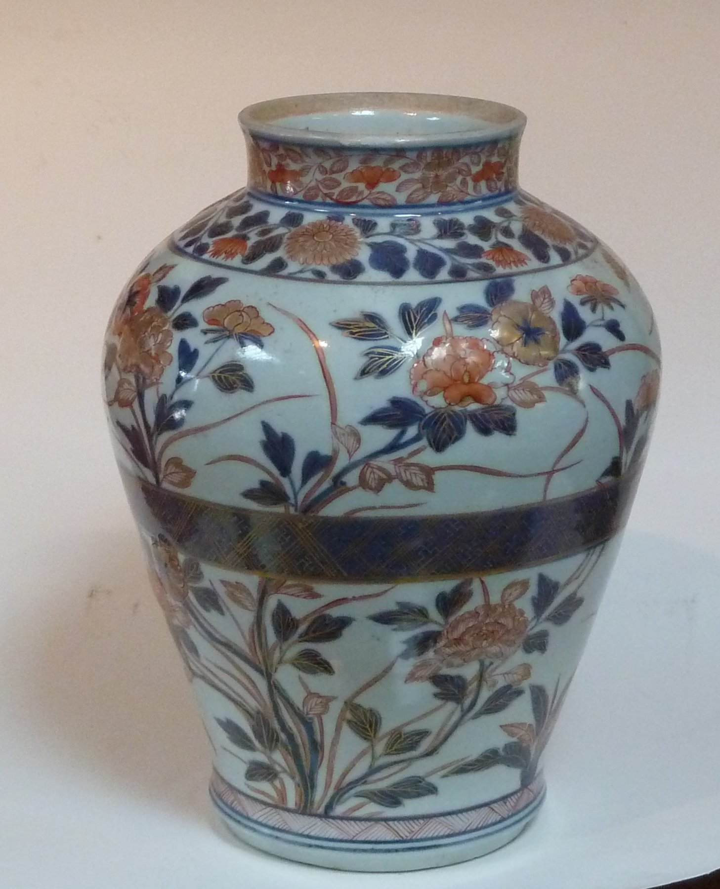 Appraisal: A Japanese Imari baluster jar circa moulded and painted chrysanthemums