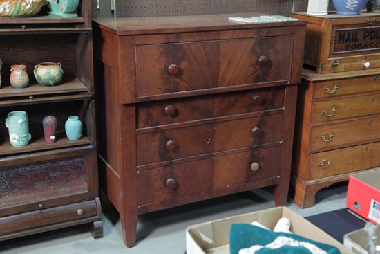 Appraisal: EMPIRE CHEST OF DRAWERS Mahogany veneered having a large top