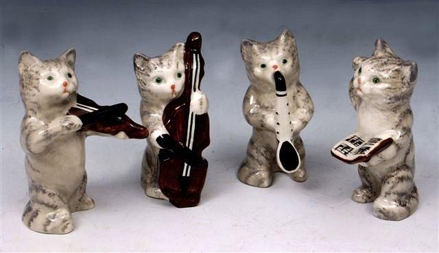 Appraisal: A BESWICK FOUR PIECE BAND of cat musicians one playing