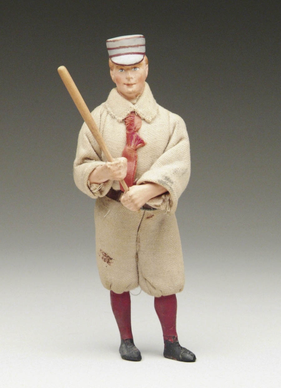 Appraisal: BASEBALL PLAYER CANDY CONTAINER Composition baseball player dressed with a