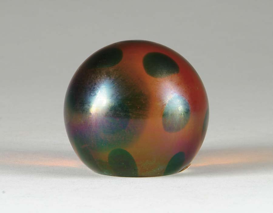 Appraisal: ART GLASS PAPERWEIGHT Art glass paperweight is amber in color