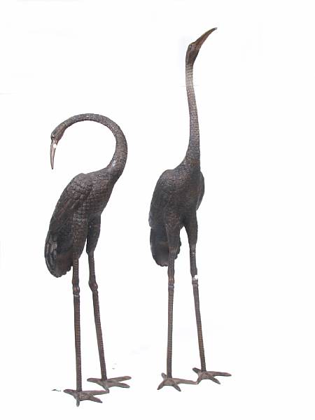 Appraisal: A pair of large patinated bronze cranes height ft in