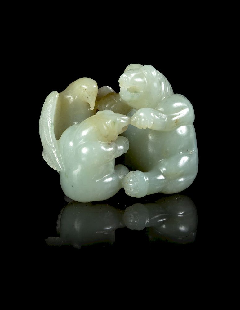 Appraisal: A Pale Celadon Jade 'Bears and Eagle' Group Length in