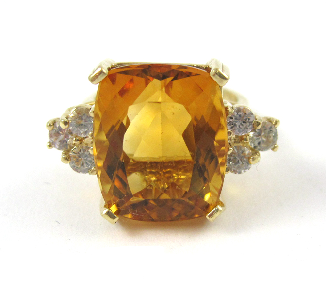 Appraisal: CITRINE DIAMOND AND FOURTEEN KARAT GOLD RING with three round-cut