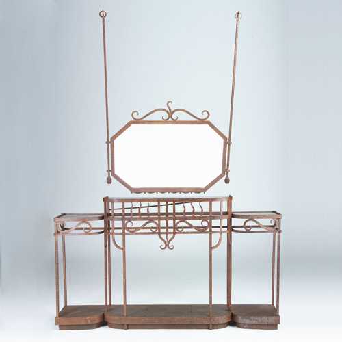 Appraisal: FRENCH ART DECO Two-tier iron console with flame and scroll