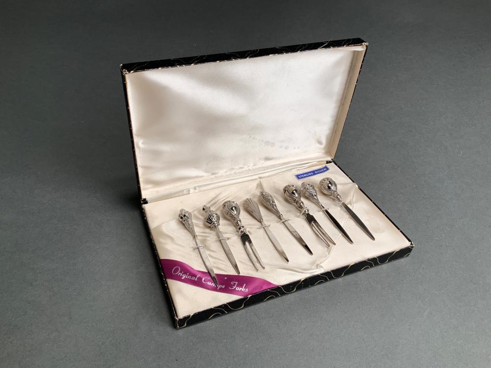 Appraisal: EIGHT STERLING SILVER CANAPE FORKS IN ORIGINAL BOXEight Sterling Silver