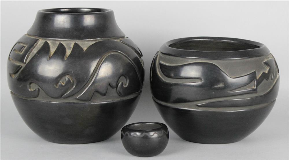 Appraisal: NATIVE AMERICAN BLACKWARE POTTERY LOT SANTA CLARA PUEBLO two carved