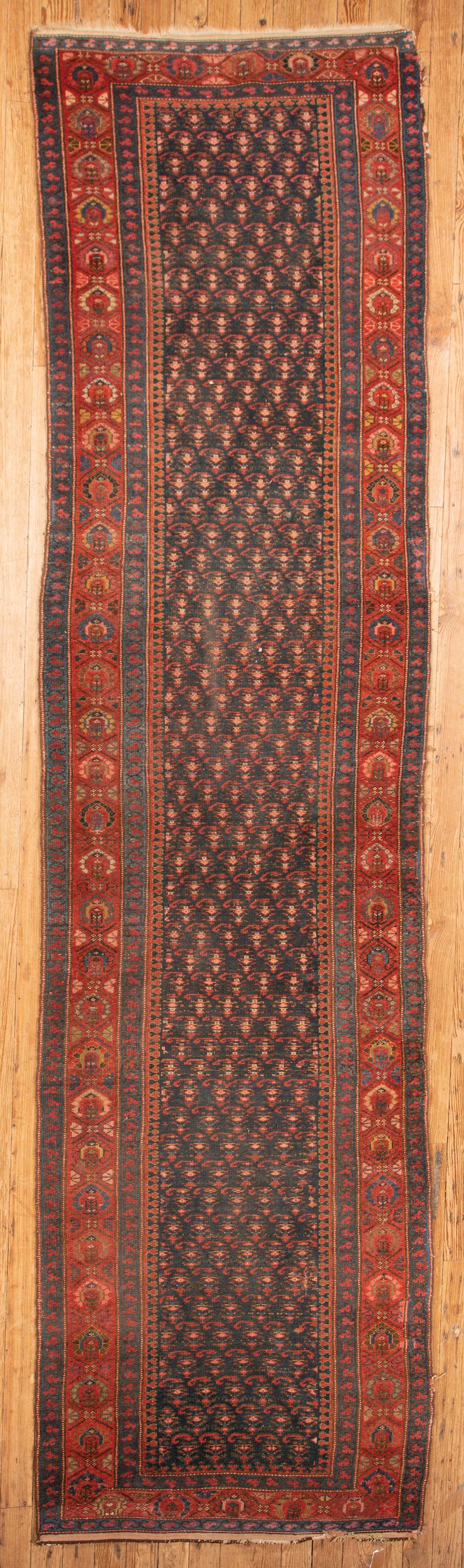 Appraisal: Semi-Antique Persian Rug dark blue ground red border overall foliate