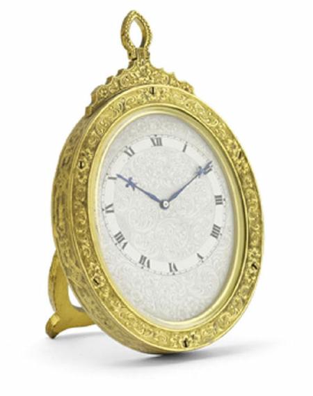 Appraisal: A fine Victorian gilt brass strut clock the oval silvered