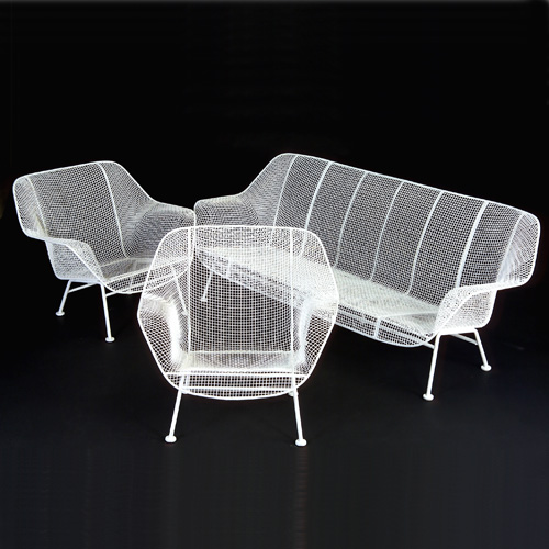 Appraisal: RUSSELL WOODARD Three-piece wire furniture suite consisting of a sofa