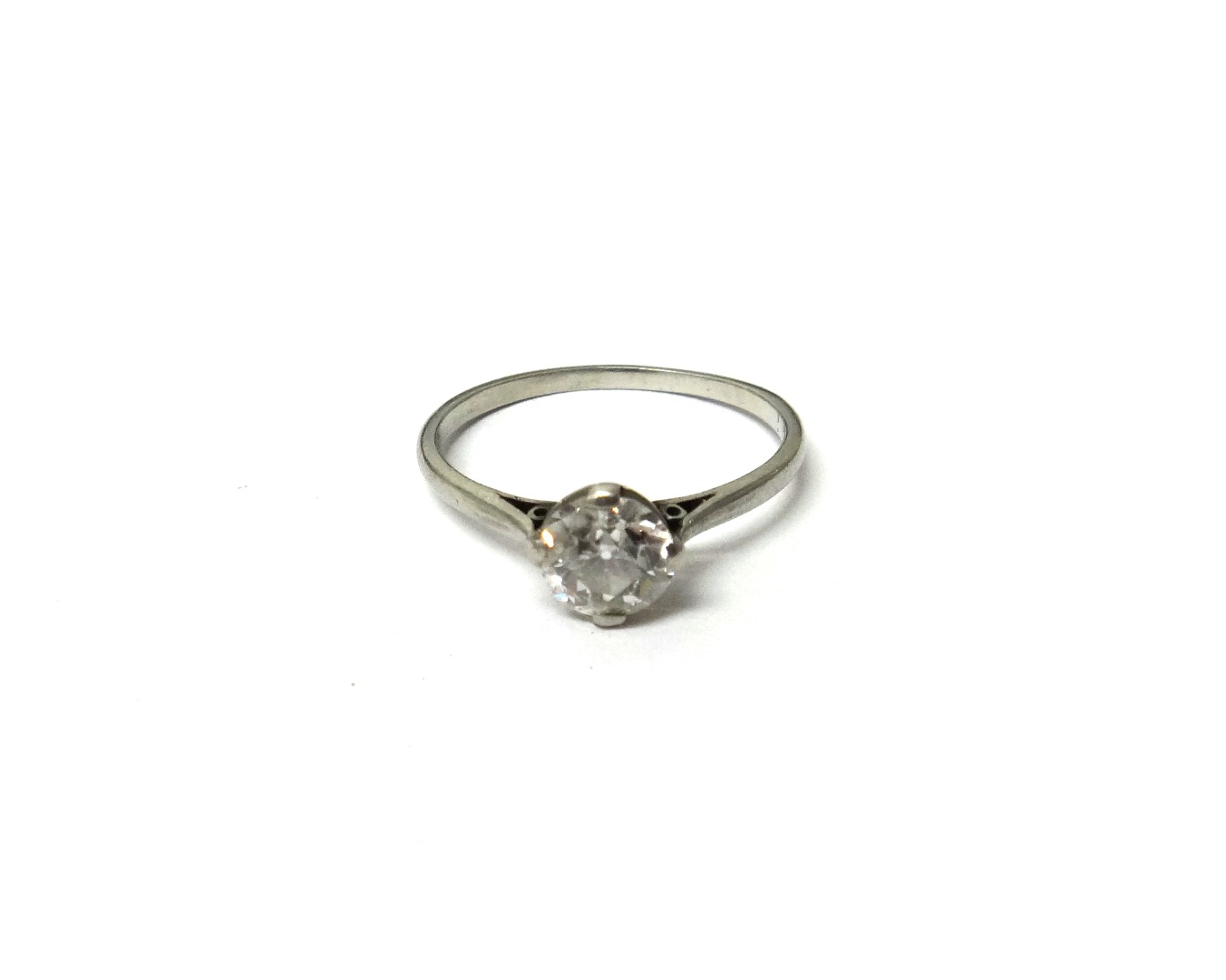 Appraisal: A diamond set single stone ring claw set with a