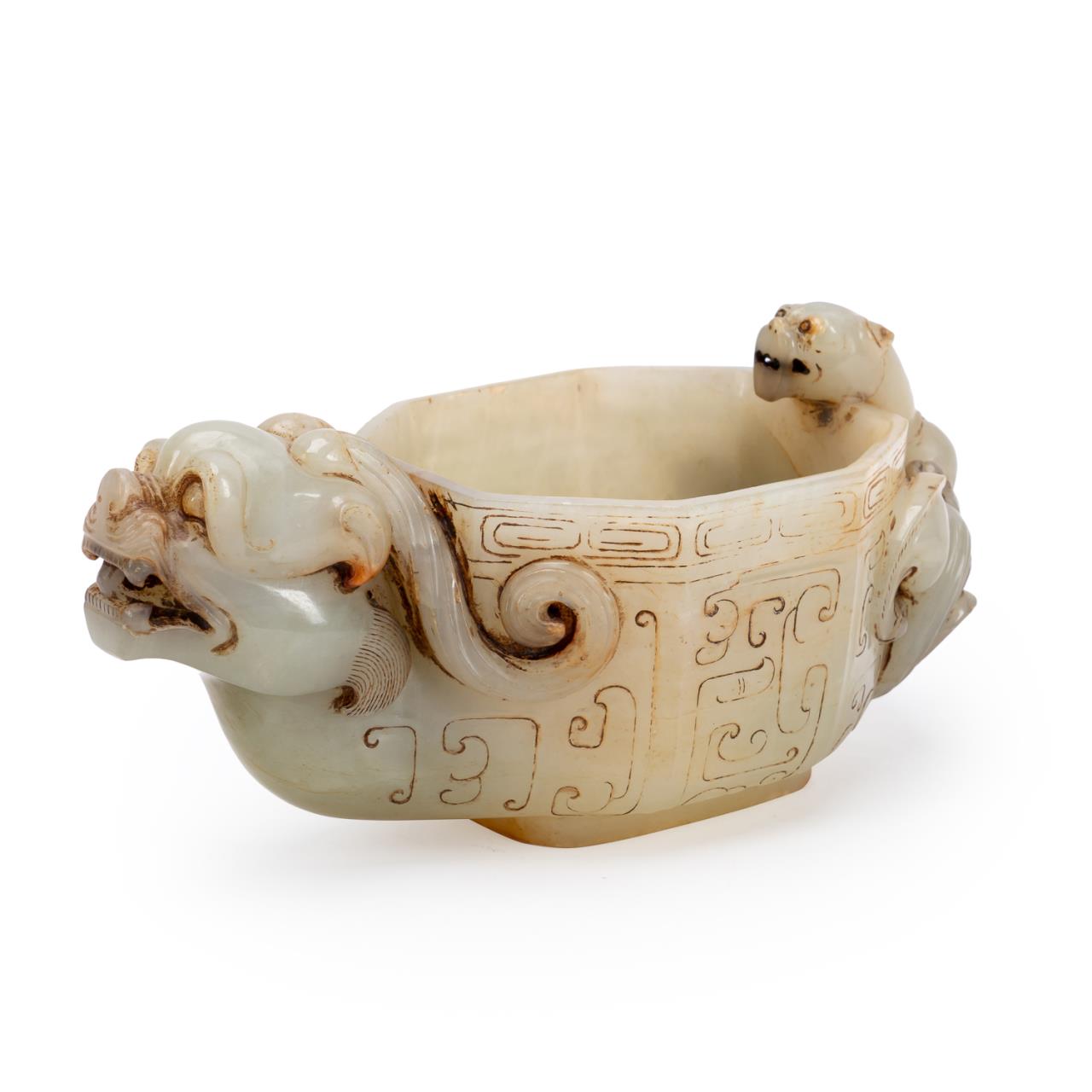 Appraisal: CHINESE HARDSTONE LIBATION CUP W DRAGONS Chinese hardstone libation cup