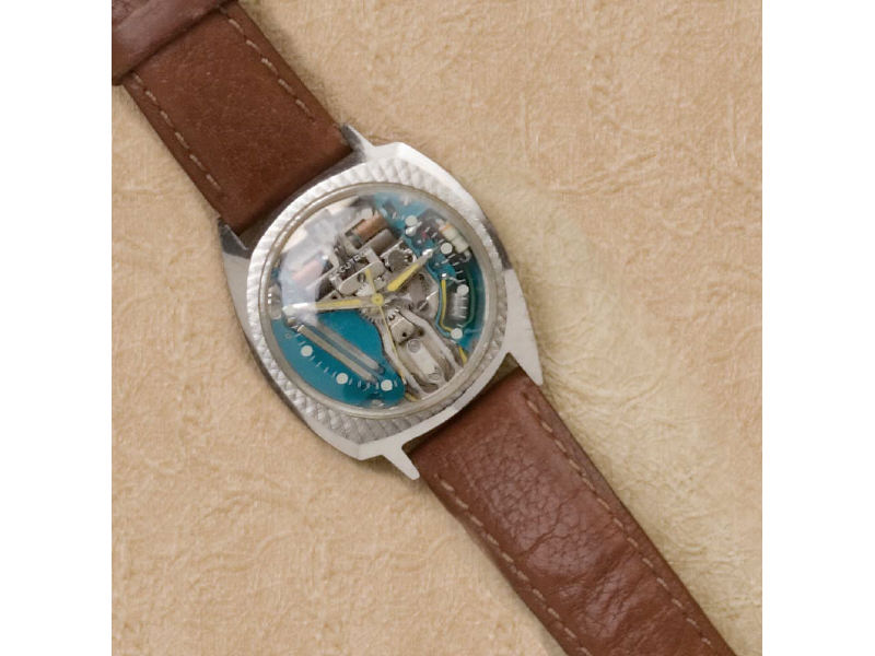 Appraisal: ACCUTRON WATCH Stainless steel with exhibition dial and brown strap