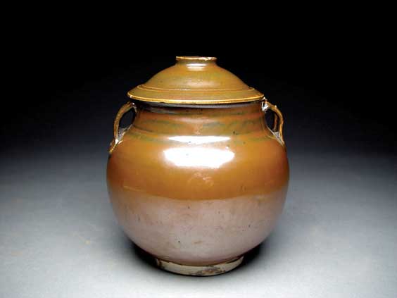 Appraisal: SONG JIN PERSIMMON GLAZED JAR Extremely rare Chinese high fired