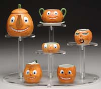 Appraisal: RARE GERMAN HALLOWEEN TEA SET Consists of pumpkin head teapot