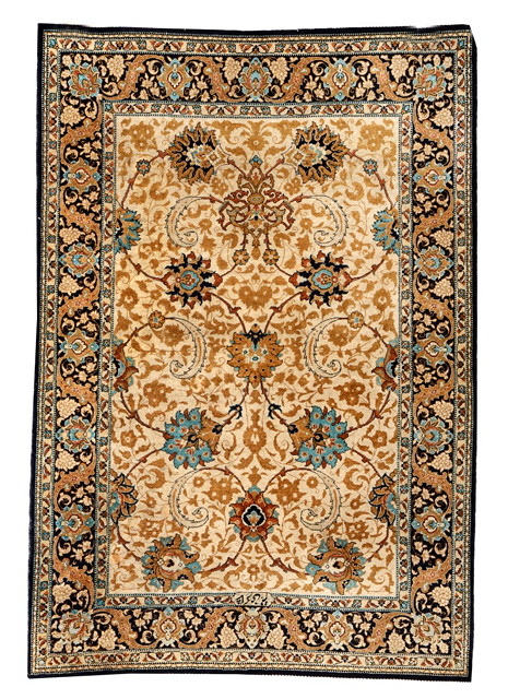 Appraisal: A PERSIAN QUM SILK RUG decorated a simple scrolling motif