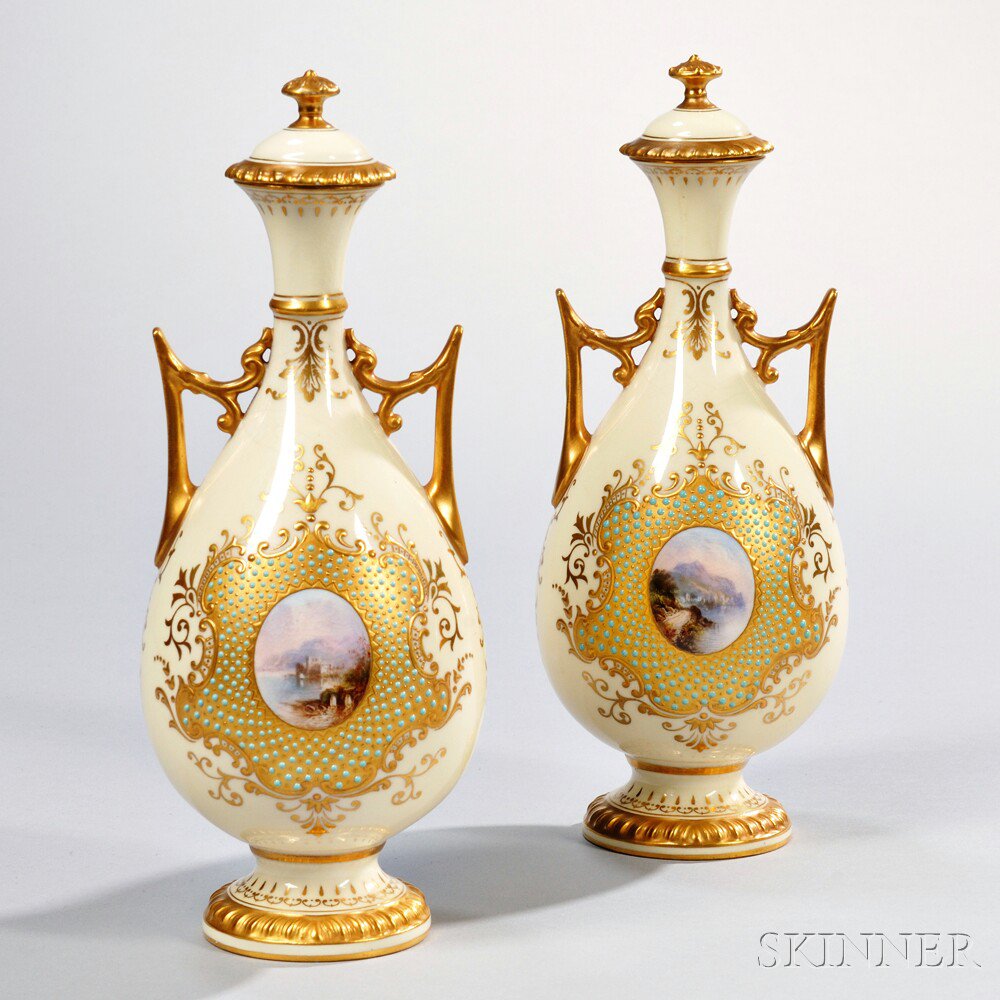 Appraisal: Pair of Jeweled Coalport Porcelain Bottle-shaped Vases and Covers England