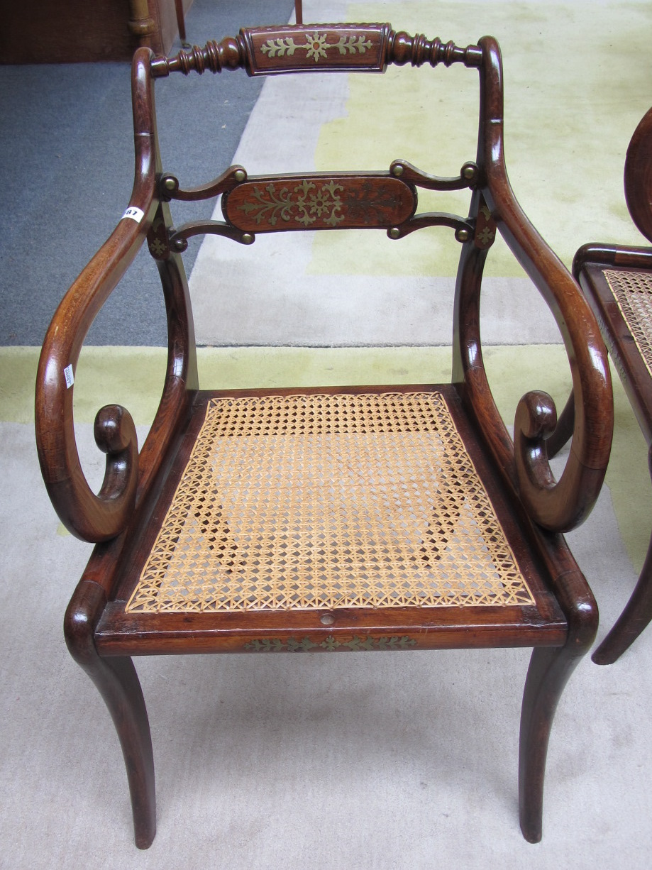 Appraisal: A set of four regency faux rosewood brass inlaid dining