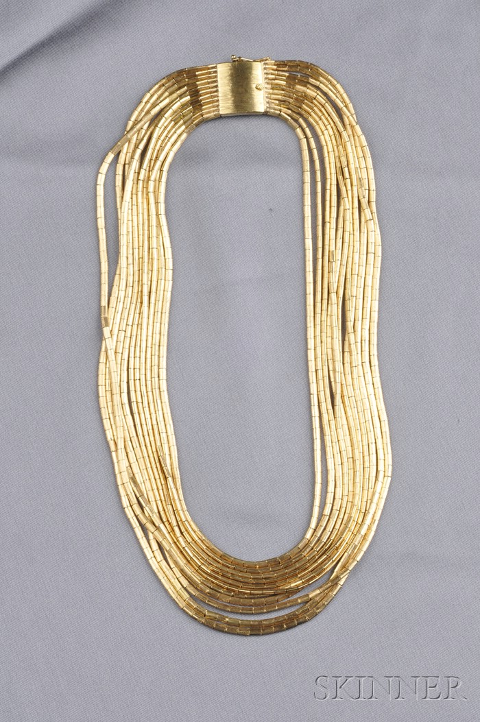 Appraisal: kt Gold Multi-strand Necklace composed of eleven flexible strands of