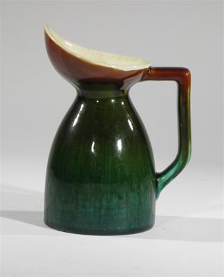 Appraisal: A Linthorpe Pottery jug designed by Dr Christopher Dresser model