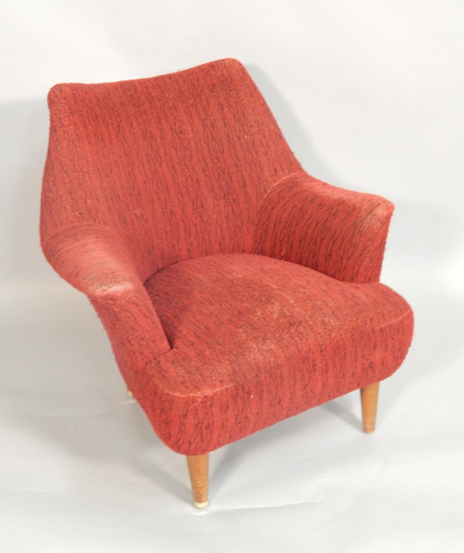 Appraisal: A 's retro style armchair with a padded back arm