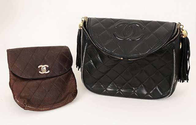 Appraisal: A Chanel bag with curved top embossed with CC logo