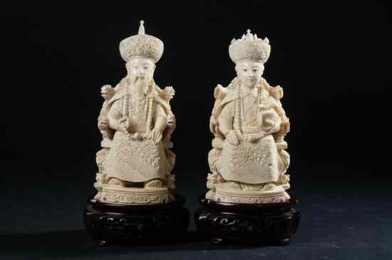 Appraisal: PAIR CHINESE CARVED IVORY FIGURES OF EMPEROR AND EMPRESS -