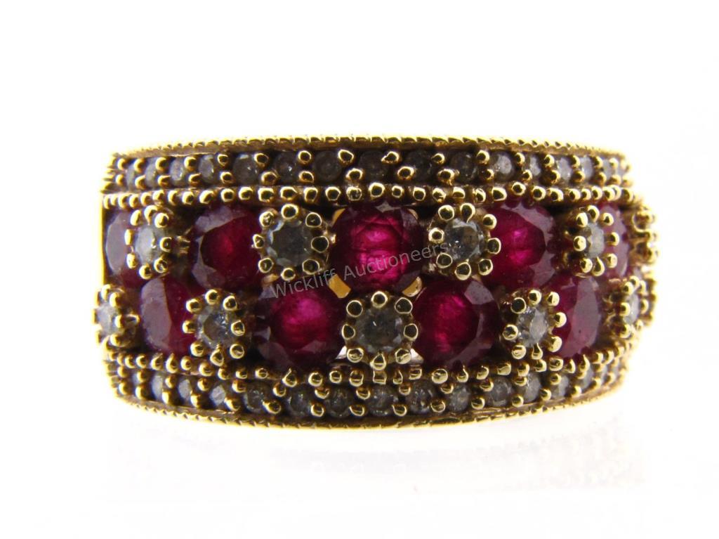 Appraisal: A K yellow gold ruby and diamond milgrain finished fashion