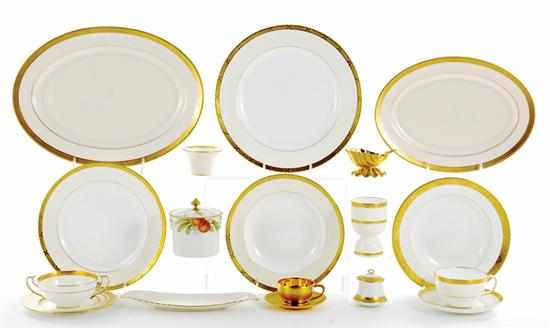 Appraisal: Minton porcelain partial dinner service gold and cream pattern comprising