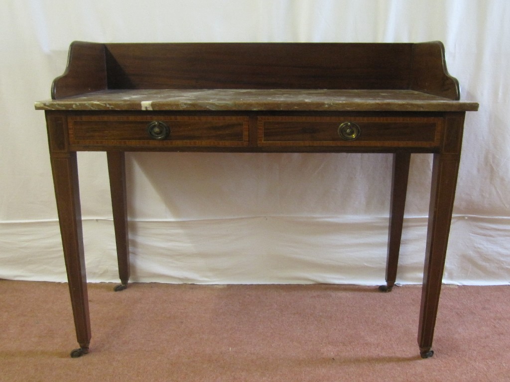 Appraisal: An Edwardian mahogany inlaid washstand the mahogany gallery raised over