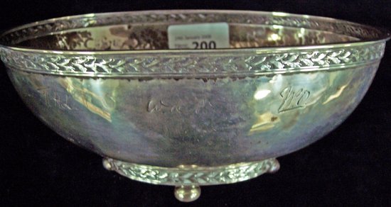 Appraisal: A bowl of oval form on bun feet inscribed with