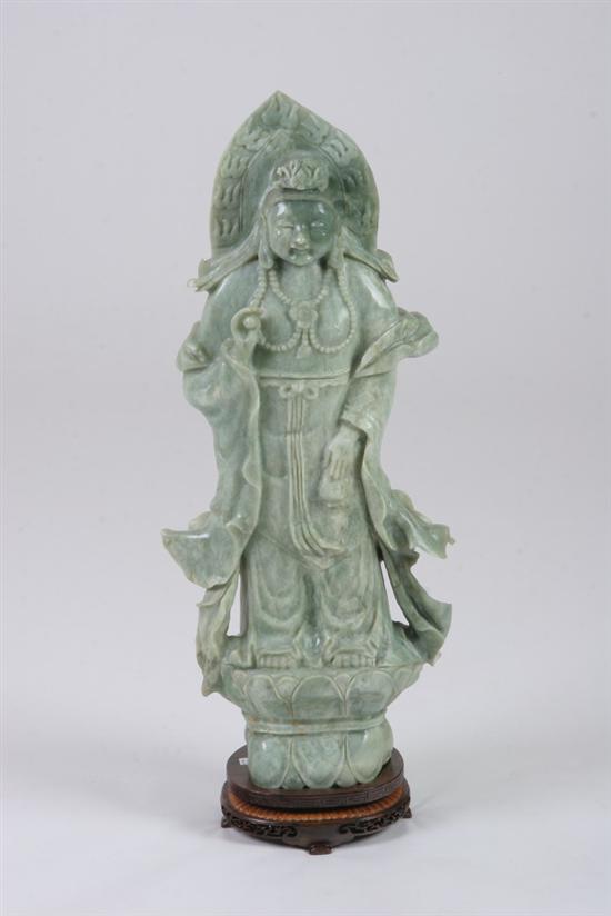 Appraisal: CHINESE GREEN SOAP STONE FIGURE OF GUANYIN th century -