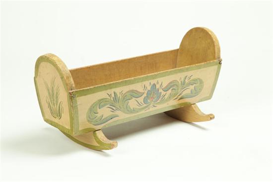 Appraisal: DECORATED DOLL CRADLE American - mixed woods Of typical form