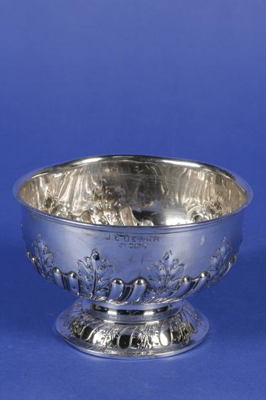 Appraisal: AN EDWARDIAN PRESENTATION BOWL of circular form the body applied