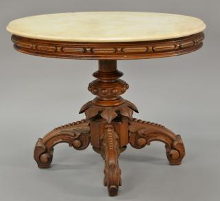 Appraisal: Victorian walnut oval marble top table on carved pedestal base