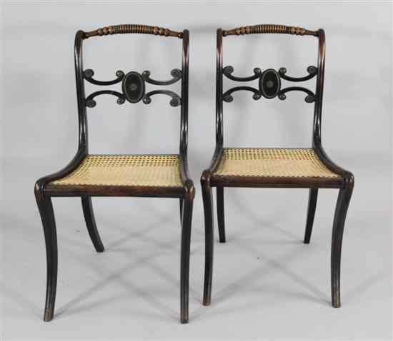 Appraisal: A set of six Regency brass inlaid beech dining chairs