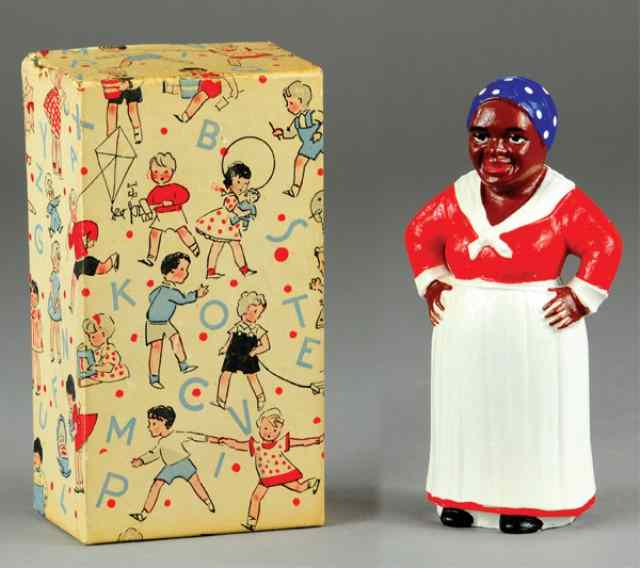 Appraisal: MAMMY STILL BANK IN BOX Cast iron painted in familiar