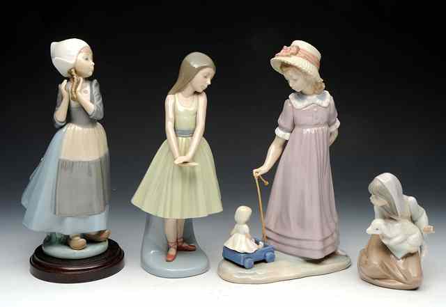 Appraisal: FOUR LLADRO FIGURES to include model no and three further