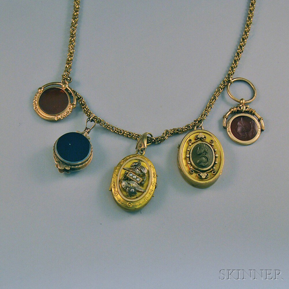 Appraisal: Five Antique Gold-filled and Hardstone Fobs and Lockets two carnelian