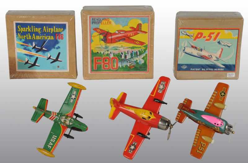 Appraisal: Lot of Tin Litho Airplane Friction Toys Description Japanese Working