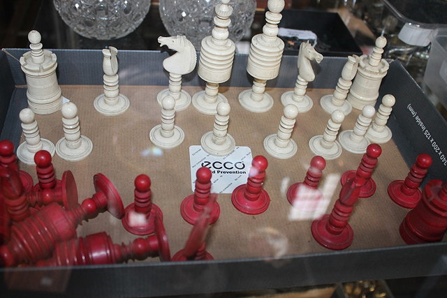 Appraisal: A CHINESE IVORY AND RED STAINED IVORY CHESS SET th