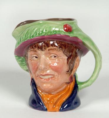 Appraisal: A ROYAL DOULTON POTTERY TOBY JUG modelled as Pearly Girl